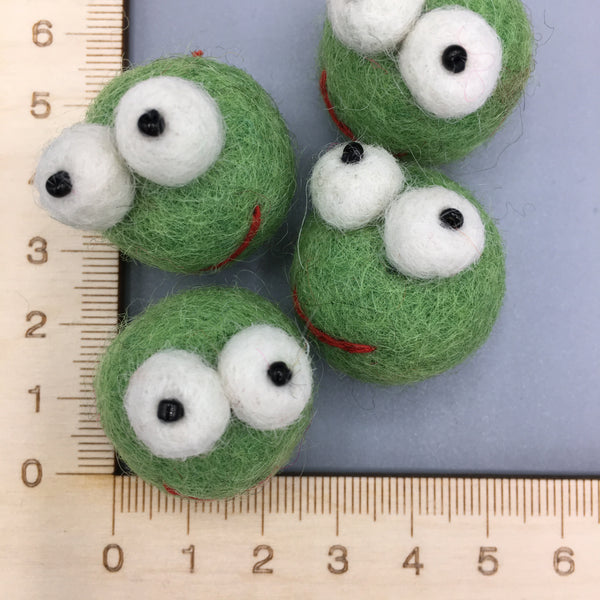 Felted sew on frog